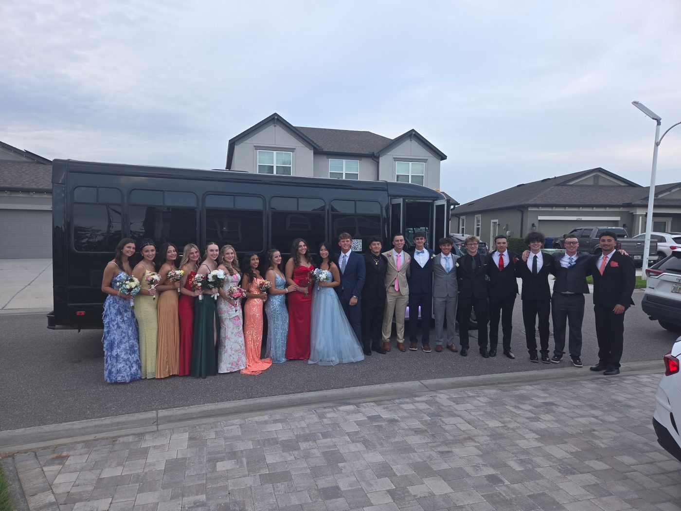 A full homecoming crew lined up at the Big Time Limo party bus