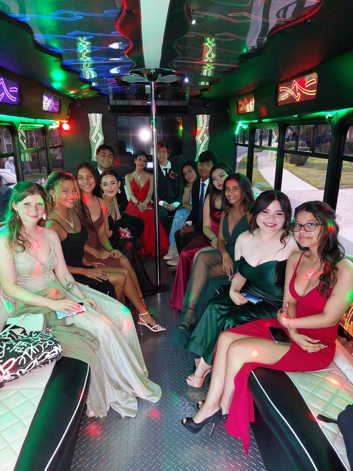 Students inside the Big Time Limo party bus